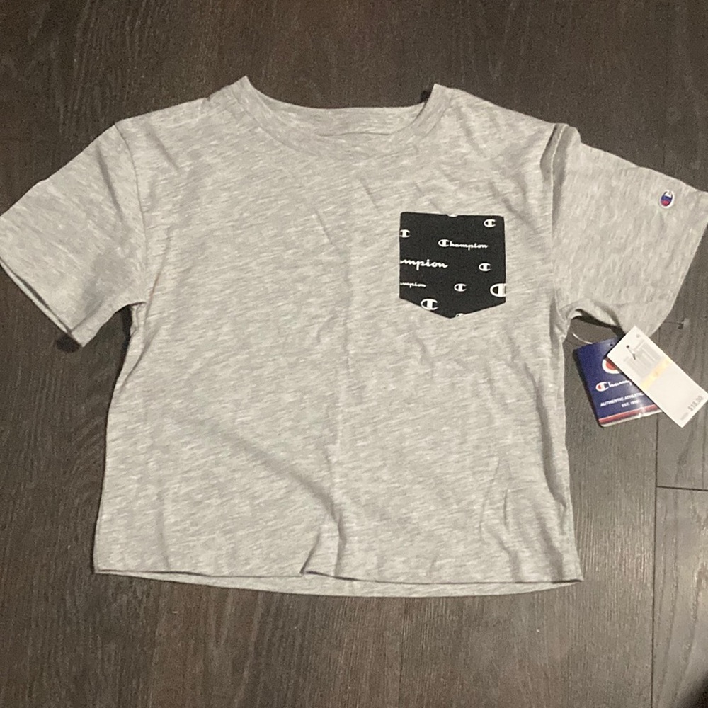 grey shirt from store: champion